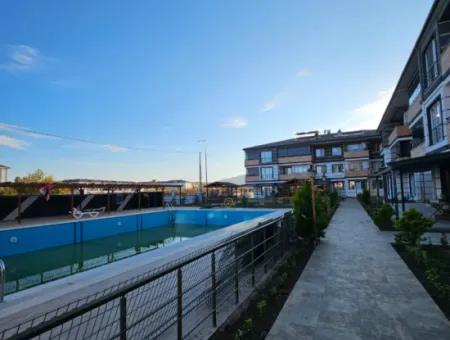 2 1 Apartment Close To The Sea In A Complex With Pool For Sale In Kumbağ Holiday Village